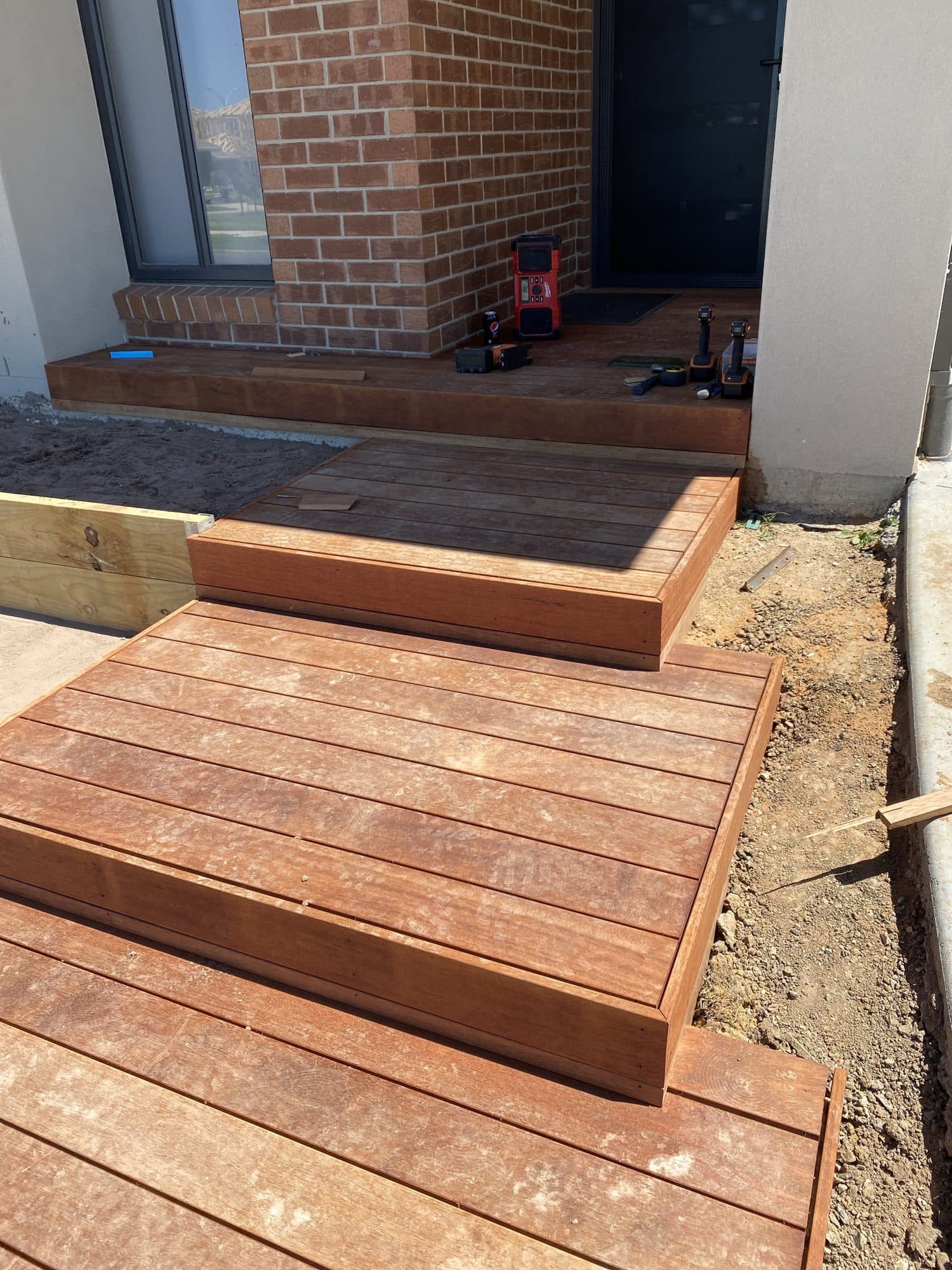 Merbau entry steps and a landing at a front door