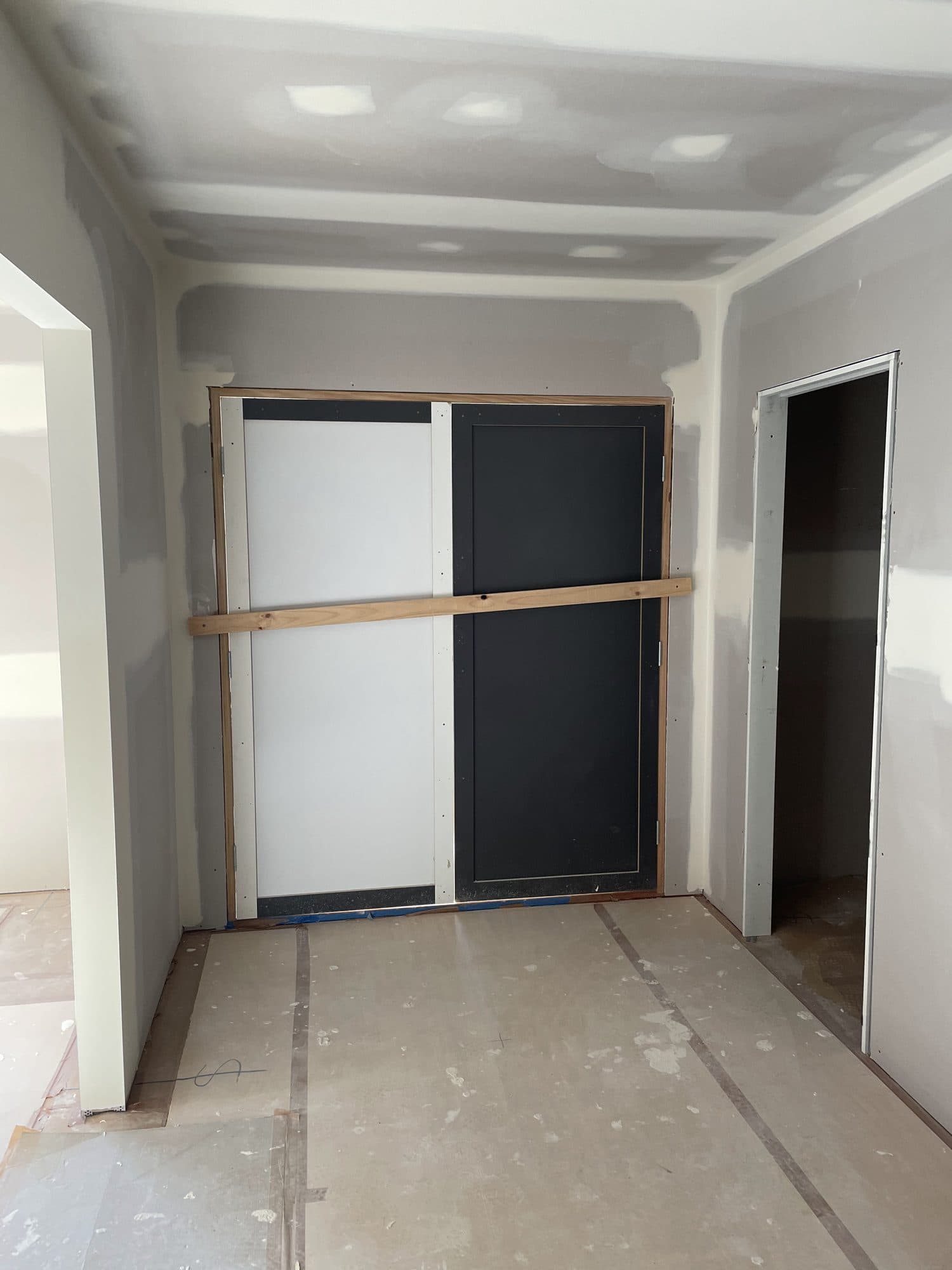 Set ceiling and walls around a new door opening