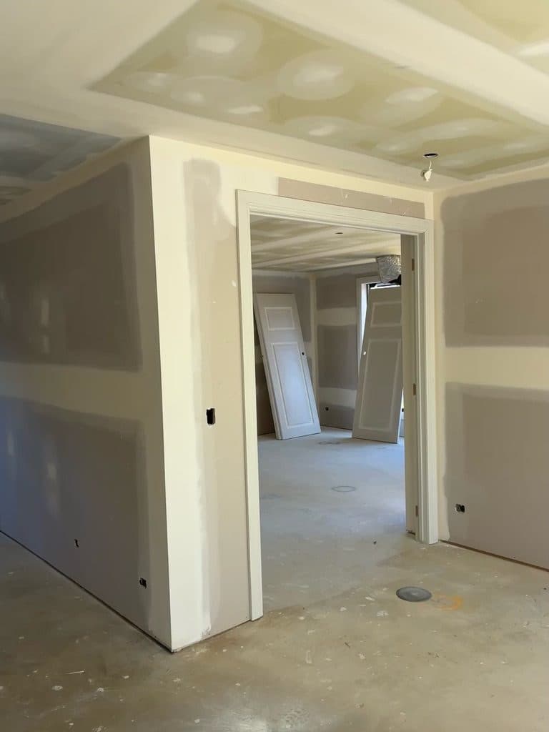 Set plaster walls and ceiling around doorways