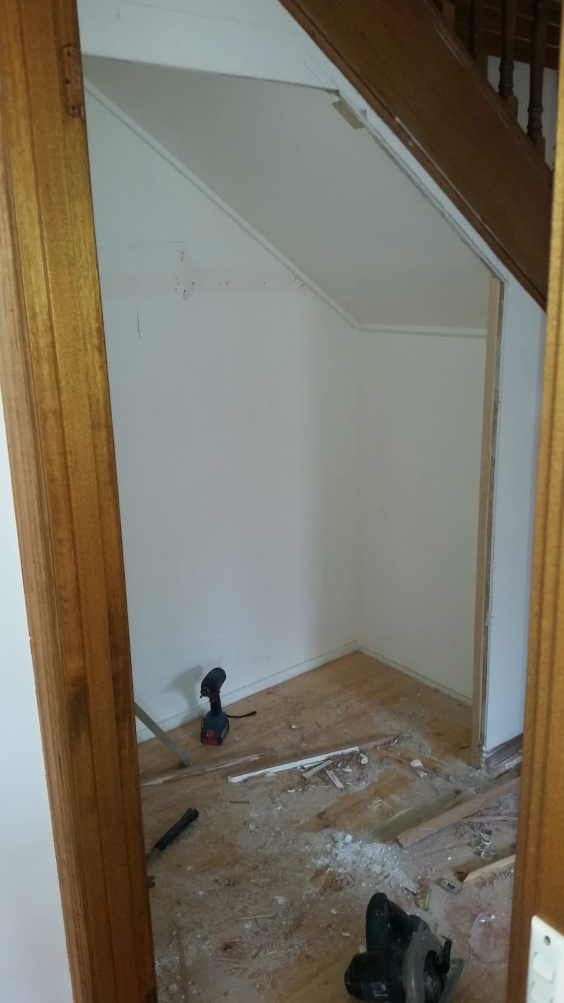 The empty space under a timber staircase