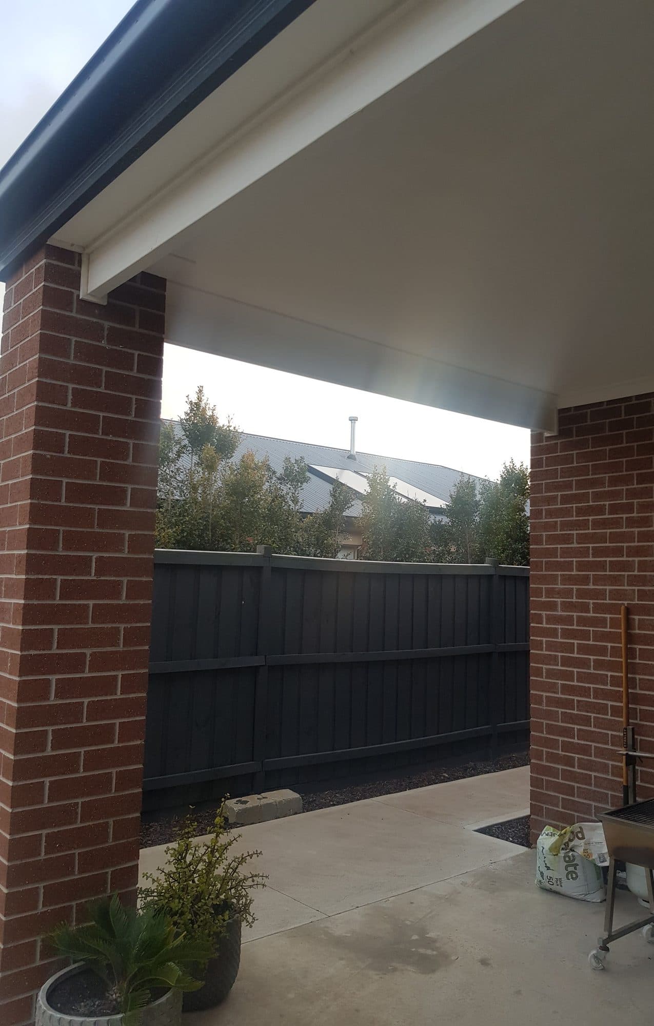 The original alfresco between two brick piers