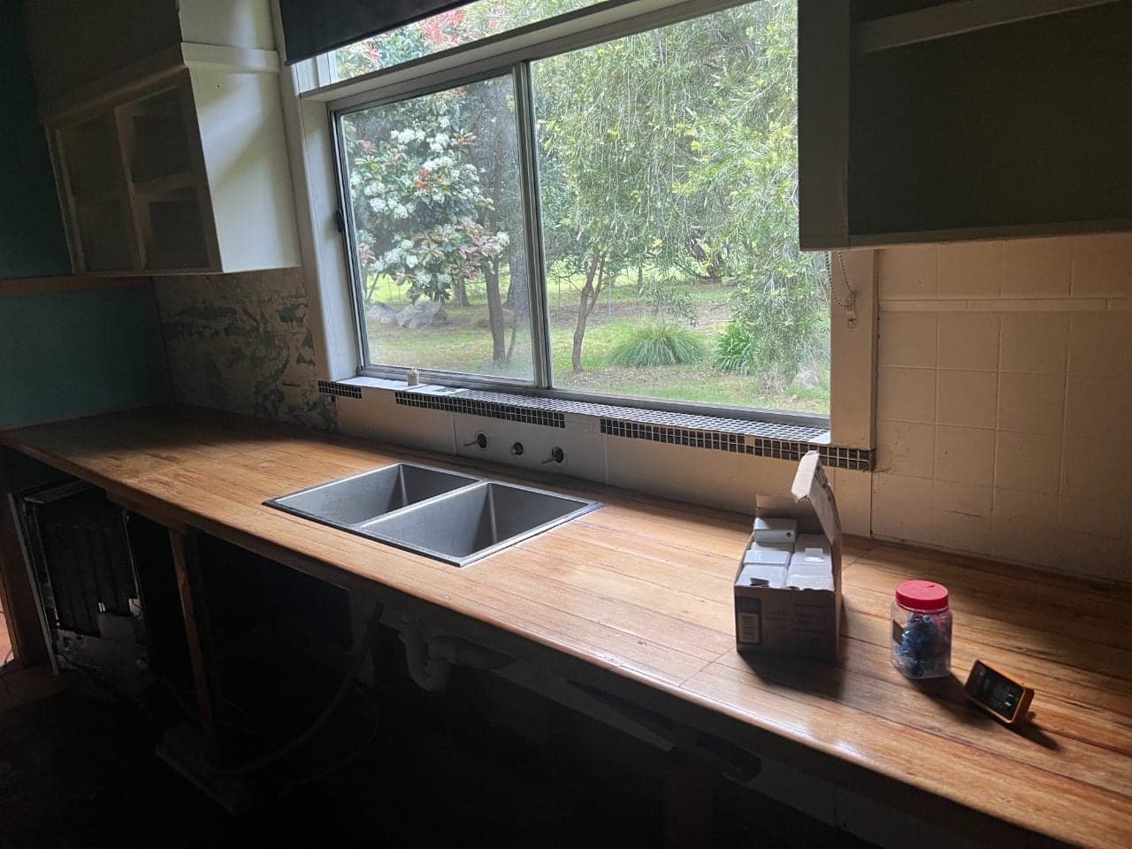 The old kitchen bench along the window wall