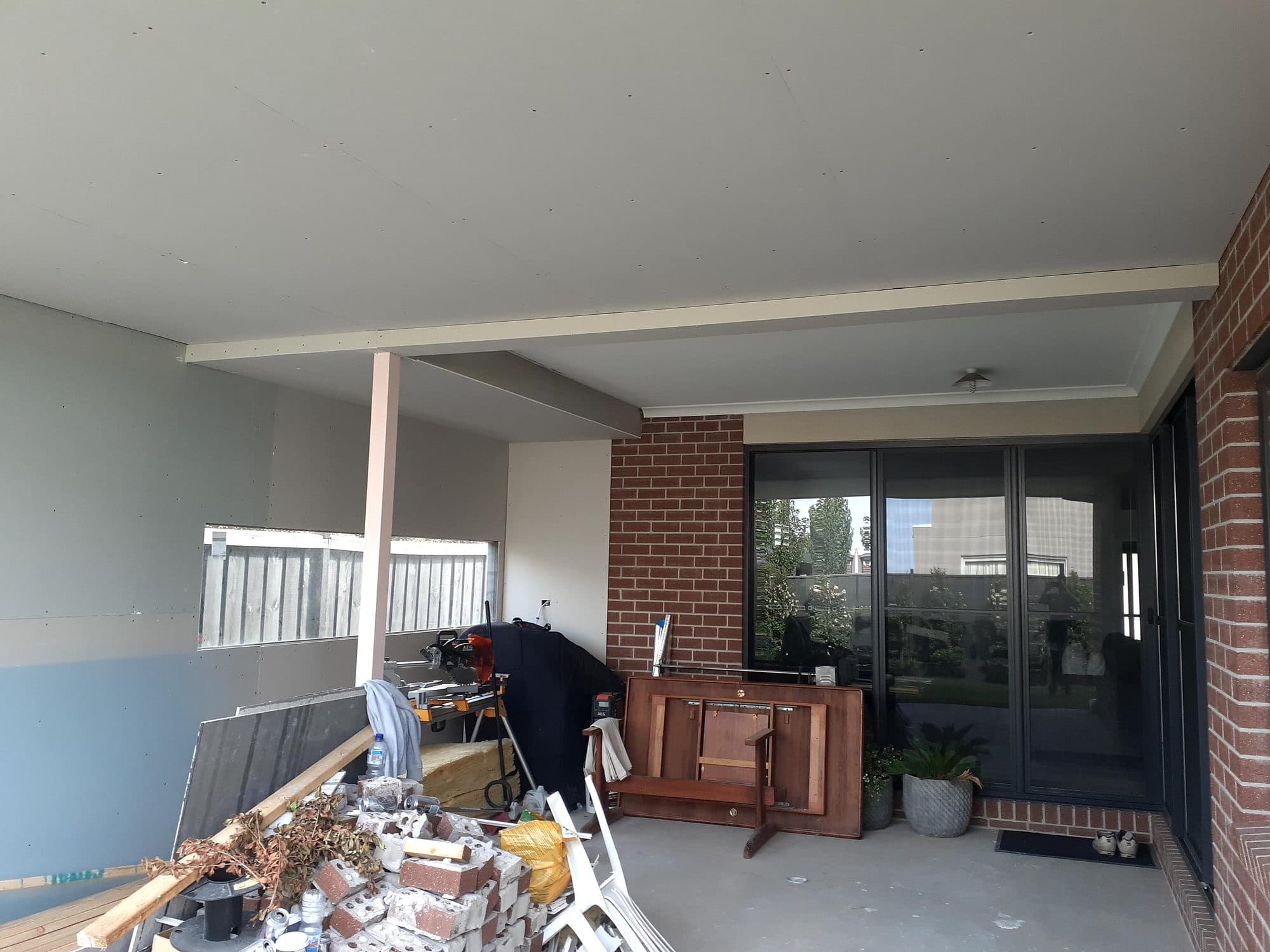 The alfresco extended with new walls lined and a new post and beam