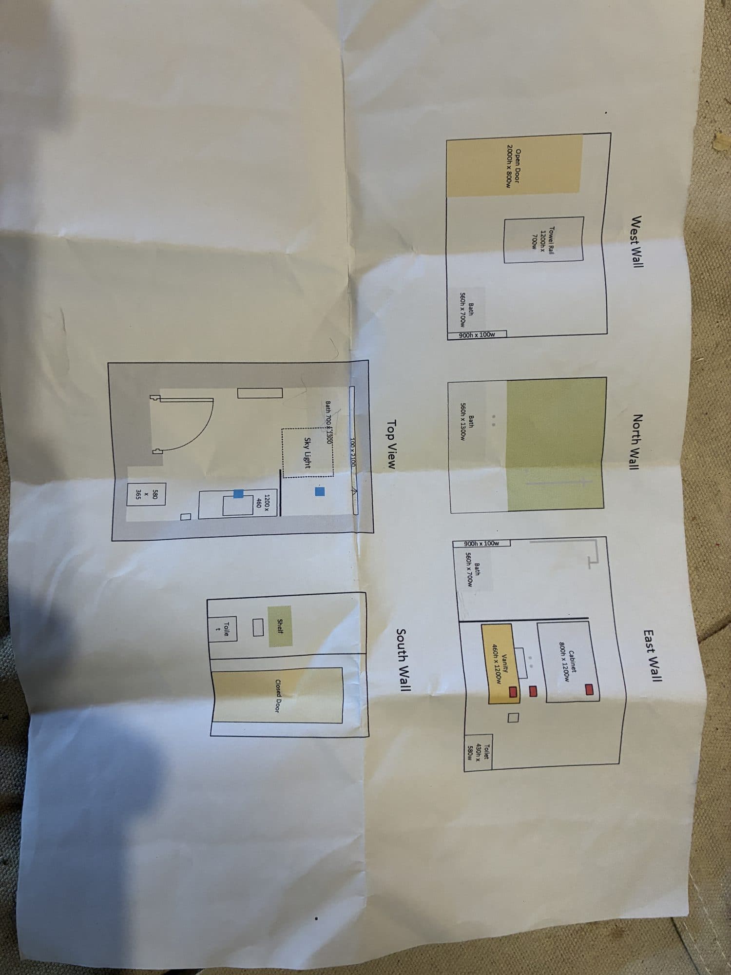 A hand-drawn tile layout for each wall of the room