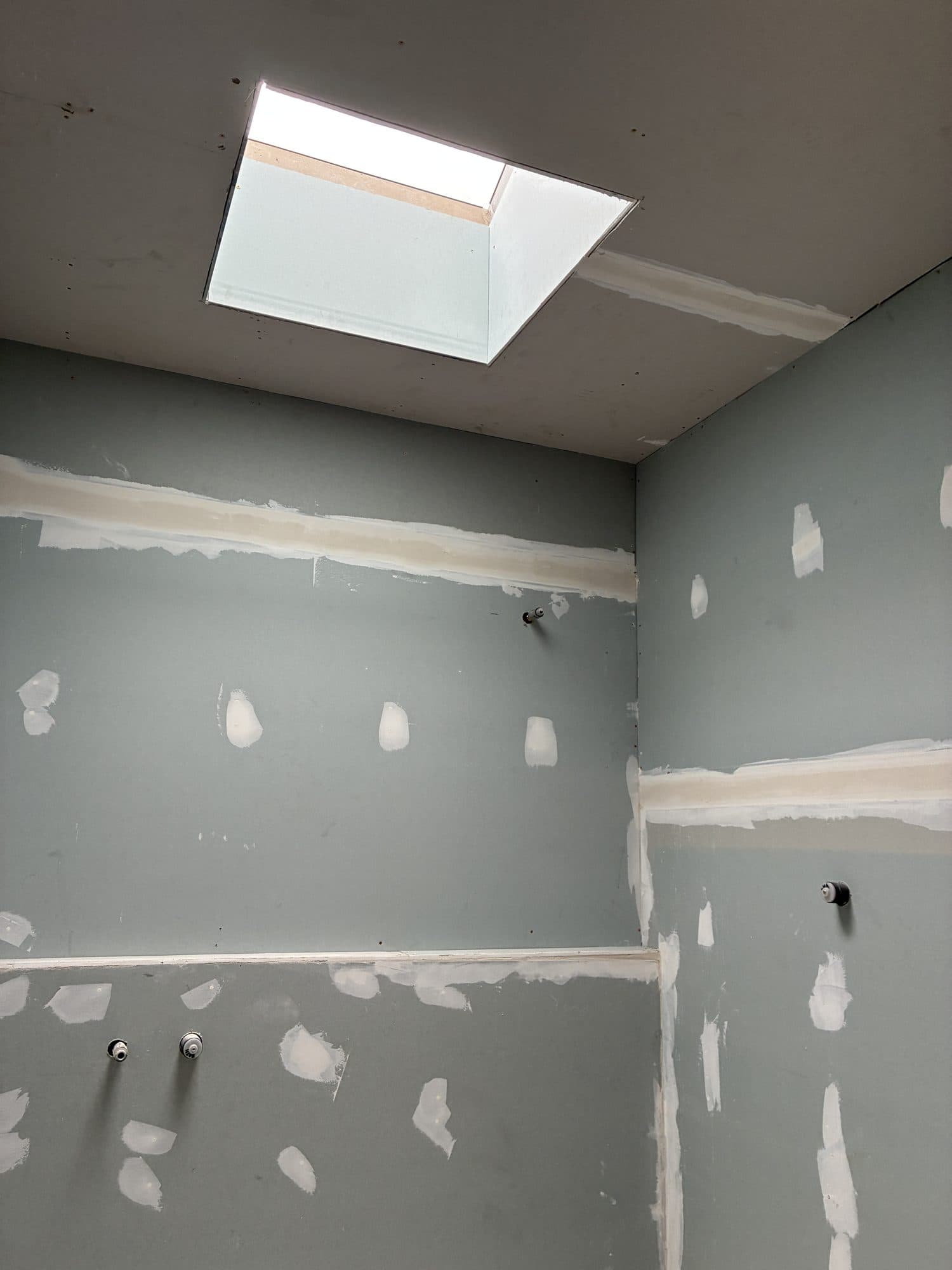 New wall linings and a new skylight in place