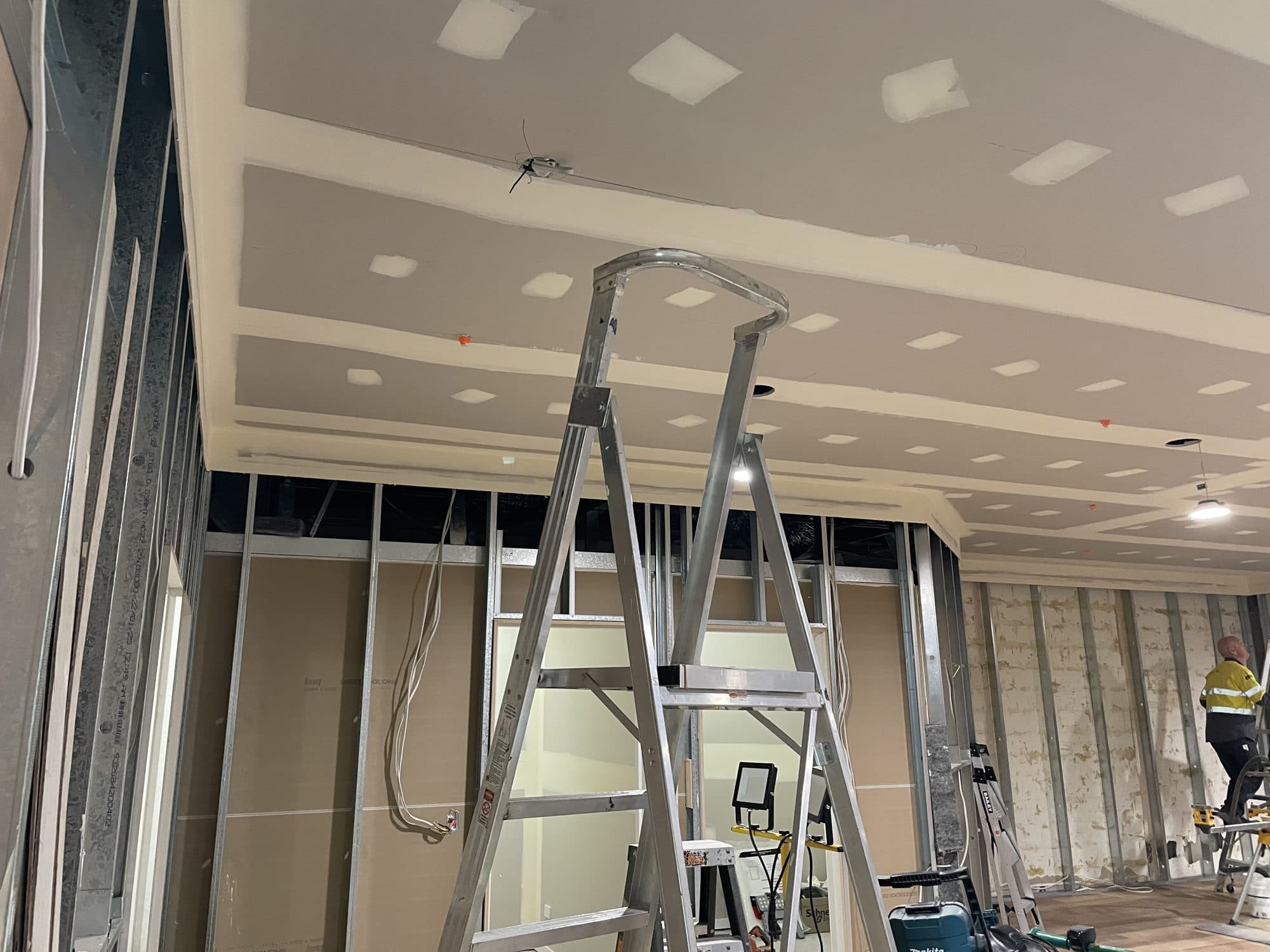 A plasterboard ceiling with bulkheads, joints set