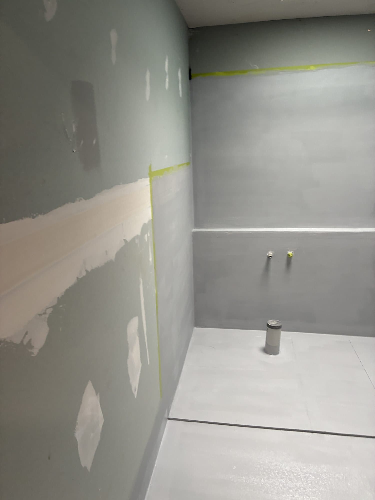 The floor prepared and set out to a strip drain