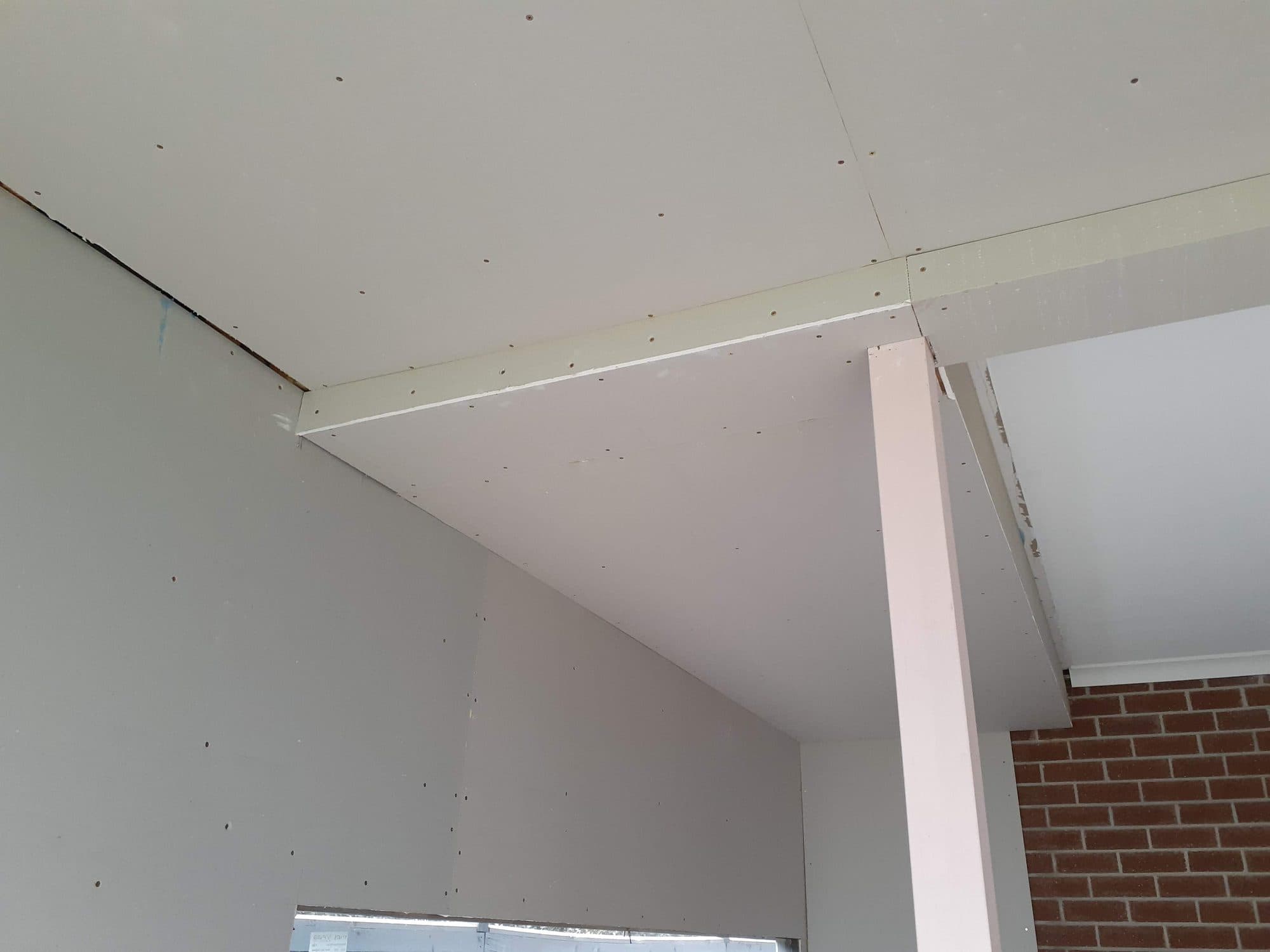 The ceiling lining where the new roof meets the house