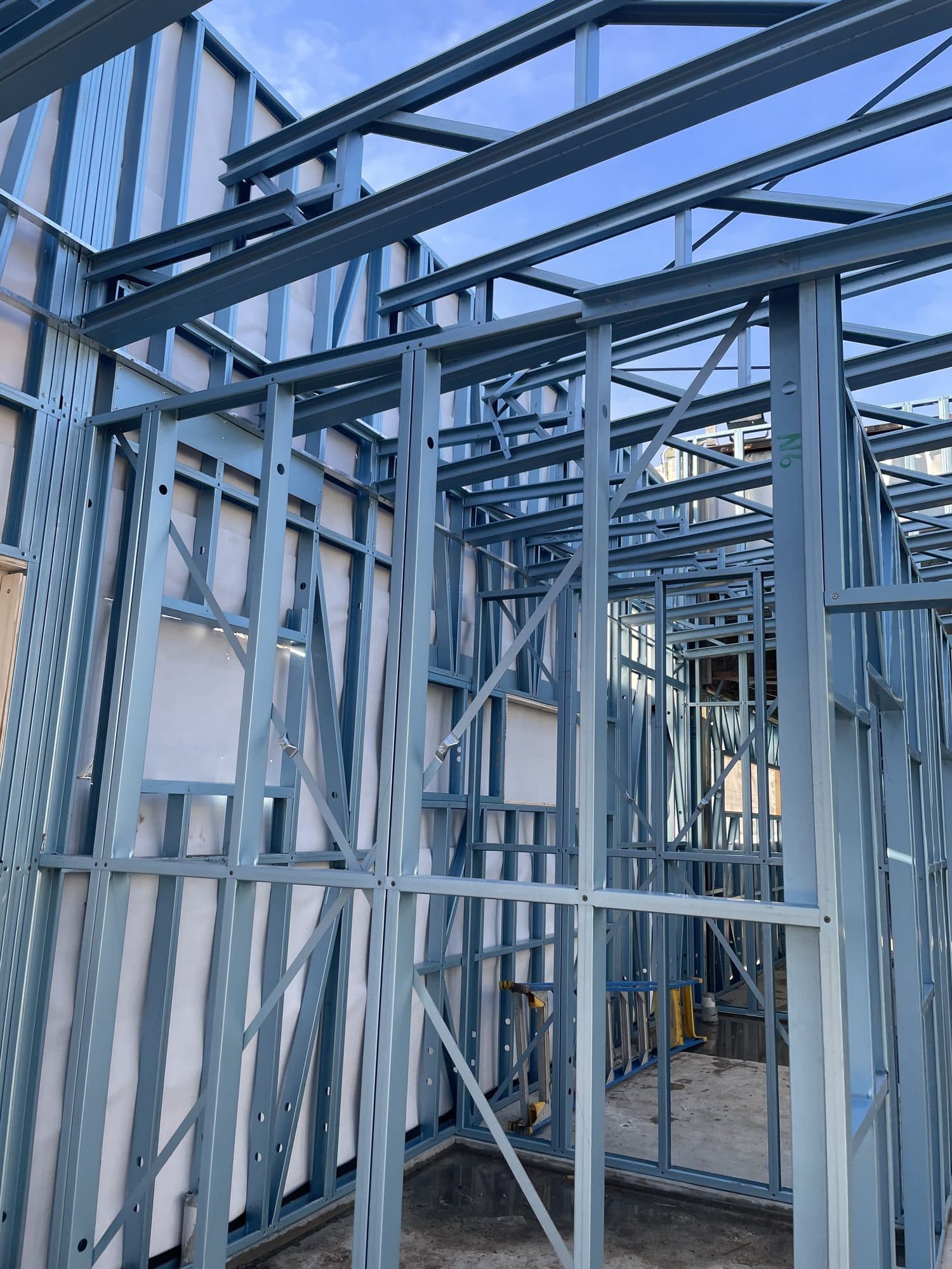 Steel wall framing with openings for doors