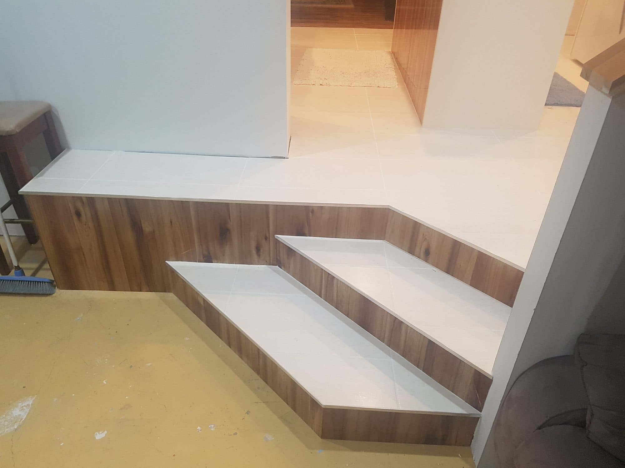 The finished steps and landing from the side
