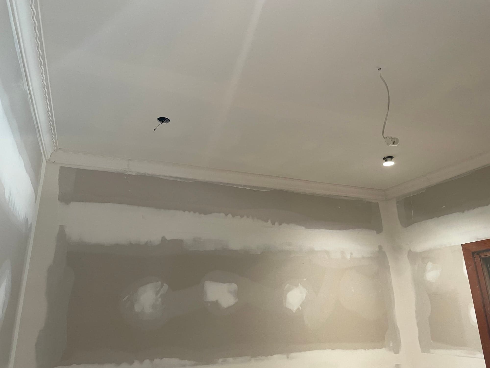Plaster set and sanded, ready for paint