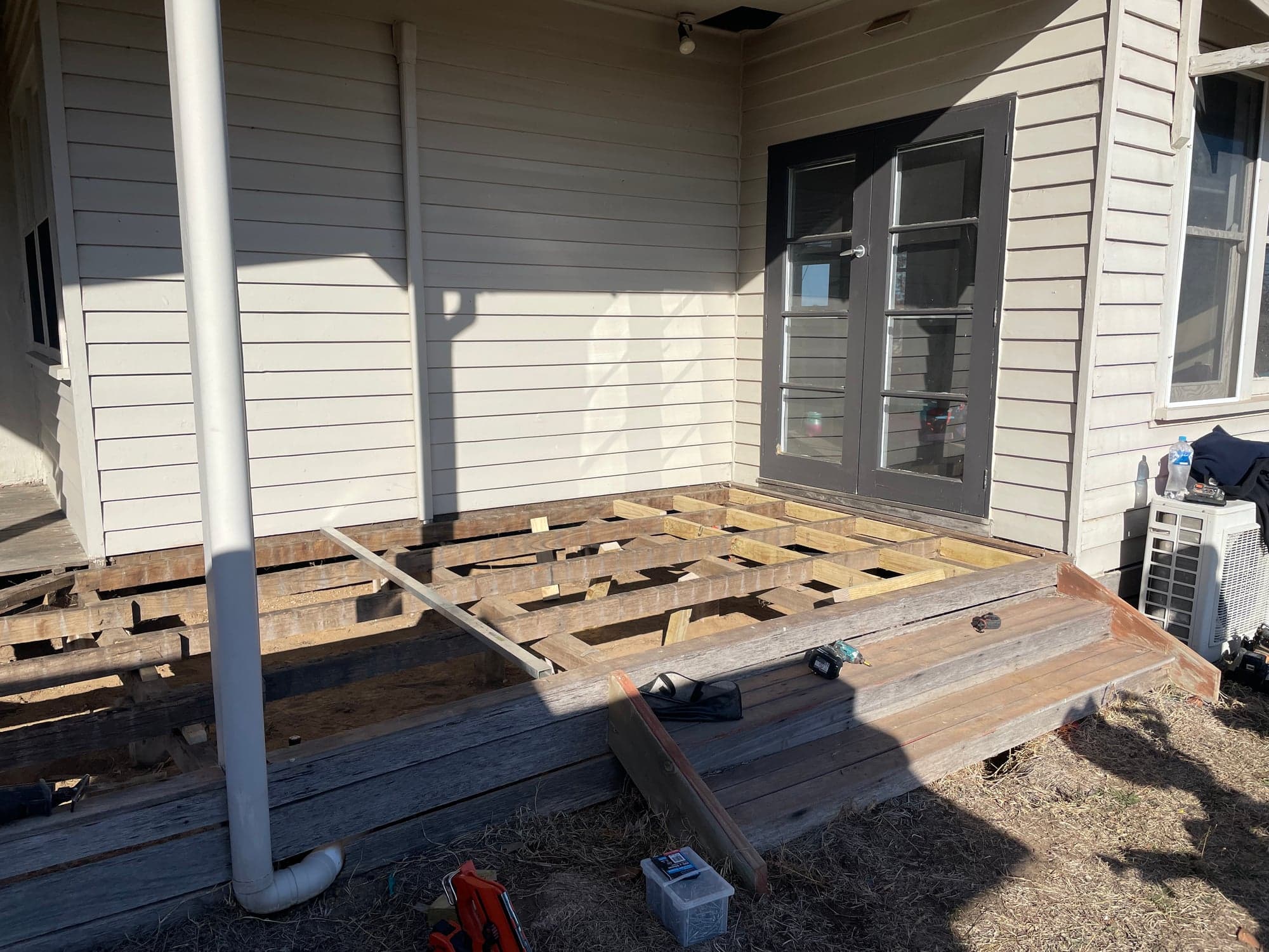 The old verandah decking lifted off the bearers